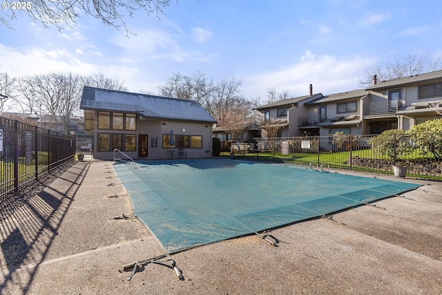 view of pool featuring a patio area