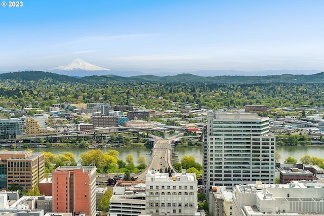 view of city with a water and mountain view