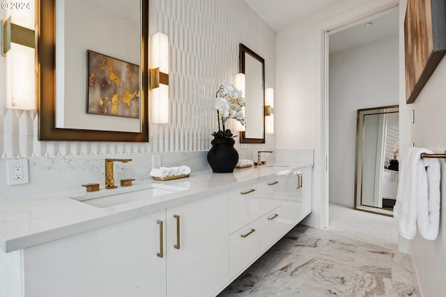 kitchen with pendant lighting, white cabinets, a kitchen bar, and light parquet flooring