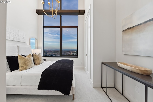 living room featuring a chandelier and built in shelves