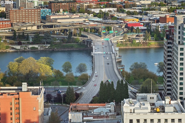 property's view of city featuring a water and mountain view