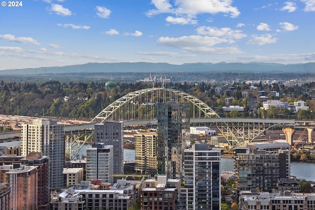 view of city with a water and mountain view