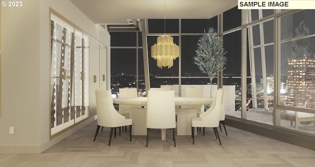 dining space featuring light parquet floors