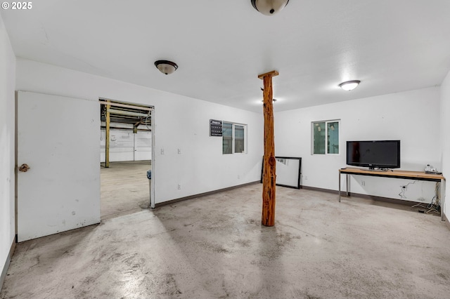 81 Mathany Rd, Carson, WA 98610 - unfurnished living room featuring unfinished concrete flooring