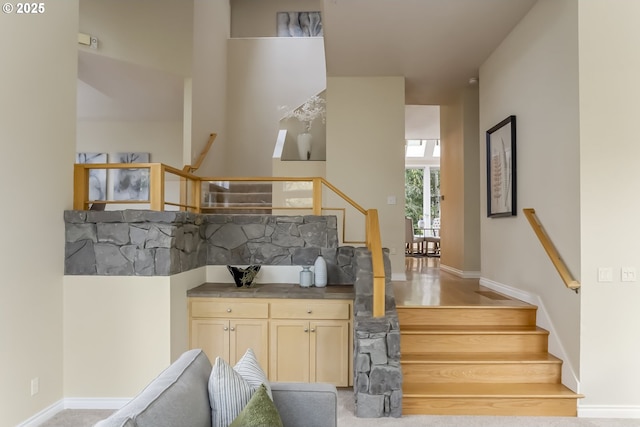 1916 NW Runnymeade Ct, Portland, OR 97229 - stairs featuring baseboards