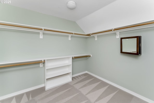 1916 NW Runnymeade Ct, Portland, OR 97229 - walk in closet featuring carpet flooring and lofted ceiling