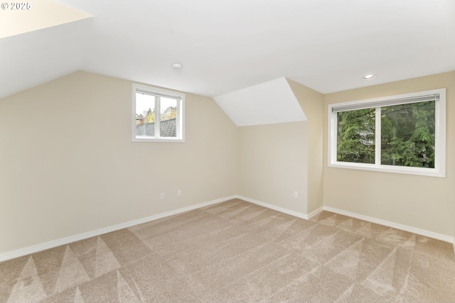 1916 NW Runnymeade Ct, Portland, OR 97229 - additional living space featuring carpet flooring, vaulted ceiling, baseboards, and recessed lighting