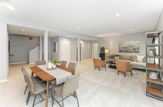 1916 NW Runnymeade Ct, Portland, OR 97229 - dining room featuring light colored carpet, recessed lighting, and baseboards