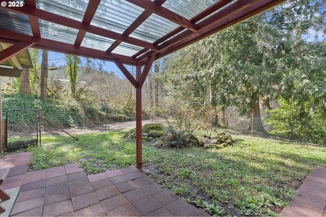view of yard with a pergola, a fenced backyard, and a patio area