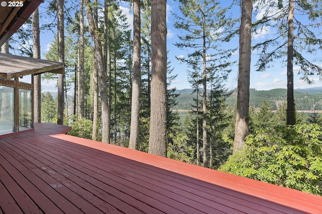 wooden terrace featuring a mountain view