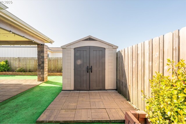937 Carter St SW, Bandon, OR 97411 - view of shed featuring a fenced backyard