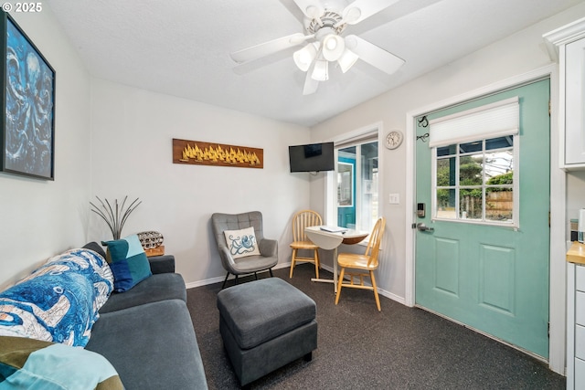 interior space featuring ceiling fan