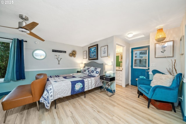 bedroom featuring ceiling fan and light hardwood / wood-style flooring