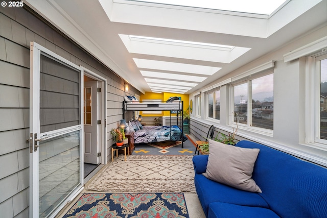 sunroom / solarium featuring a skylight