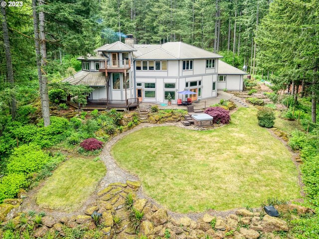 22091 S Ridge Rd, Oregon City, OR 97045 - rear view of house with a yard