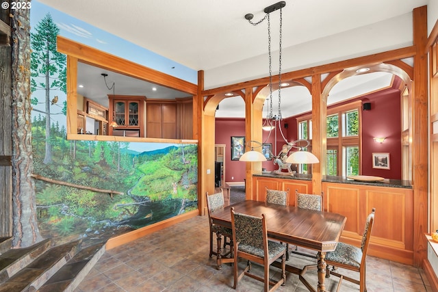 22091 S Ridge Rd, Oregon City, OR 97045 - dining space with dark tile floors and an inviting chandelier