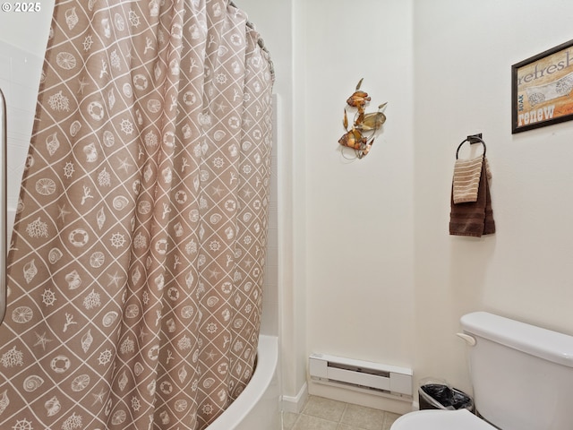 bathroom featuring tile patterned flooring, shower / bath combination with curtain, a baseboard heating unit, and toilet
