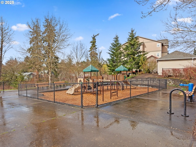 community play area featuring fence