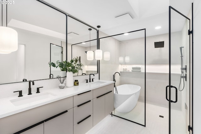 bathroom featuring independent shower and bath and vanity