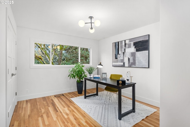 office space featuring wood-type flooring