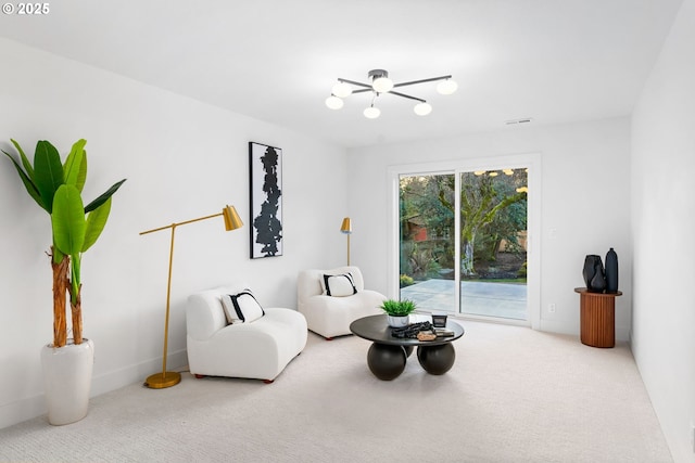 sitting room featuring carpet