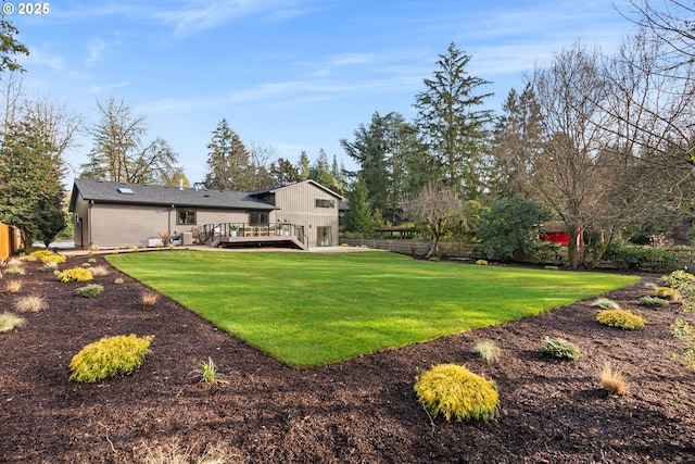 view of yard with a deck