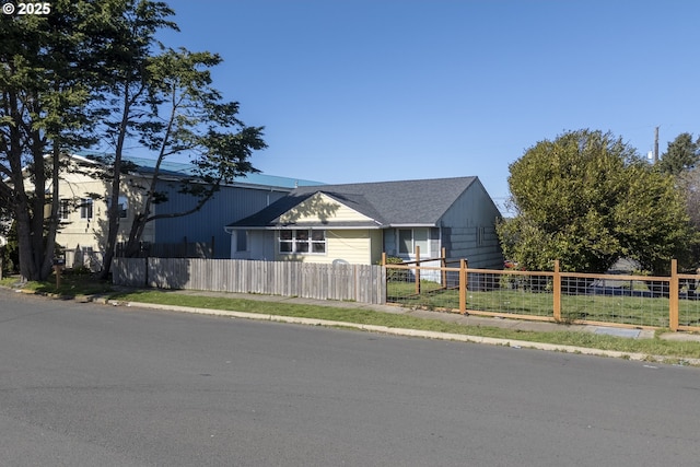 view of home's exterior with a fenced front yard