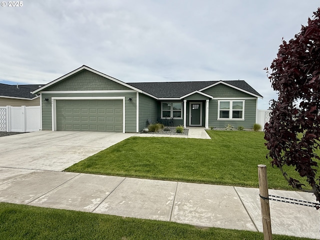 400 SW Goldfinch Ln, Boardman, OR 97818 - ranch-style home with an attached garage and driveway