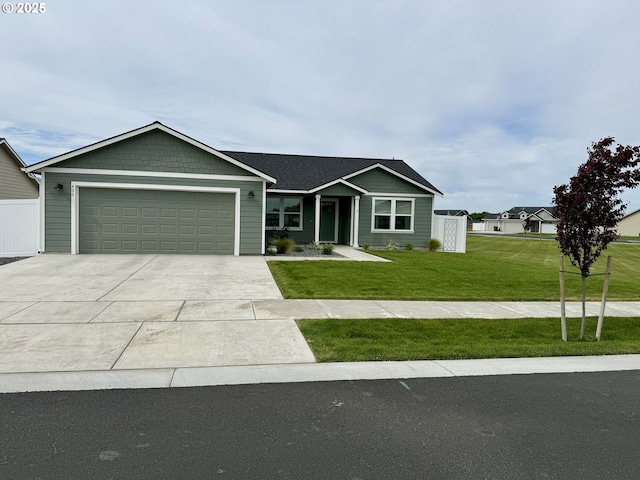 400 SW Goldfinch Ln, Boardman, OR 97818 - ranch-style house with a garage and driveway