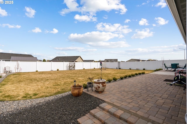 view of patio with a fenced backyard