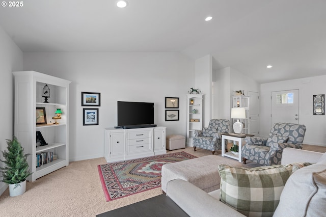 carpeted living area featuring lofted ceiling, baseboards, and recessed lighting