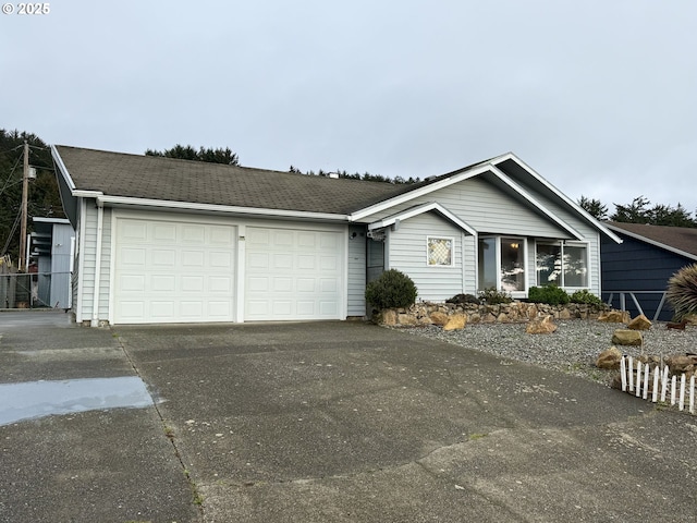 ranch-style house featuring a garage