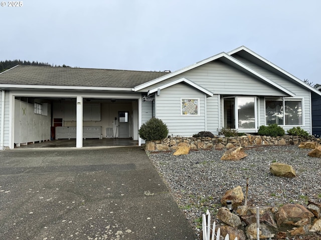 ranch-style house with a carport