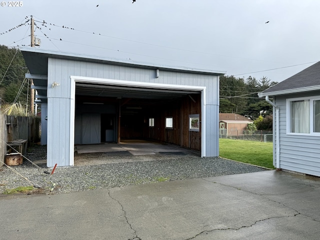 garage with a lawn