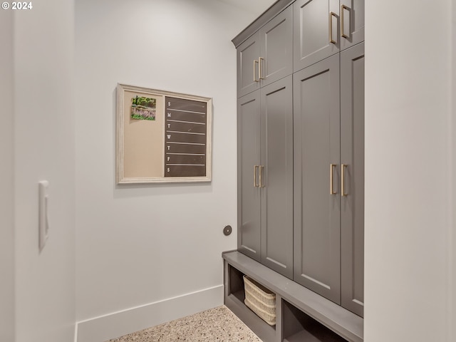 mudroom featuring a mail area