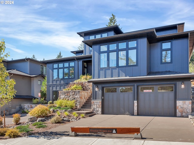 view of front of home with a garage