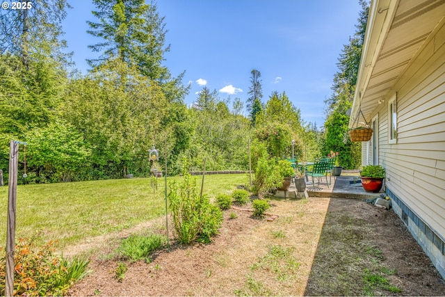 946 E 9th Pl, Coquille, OR 97423 - view of green lawn featuring a patio