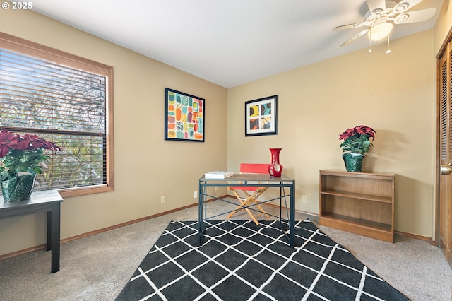 office area featuring ceiling fan and carpet