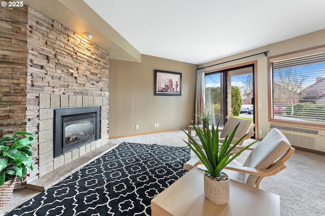 living room featuring a fireplace and carpet flooring