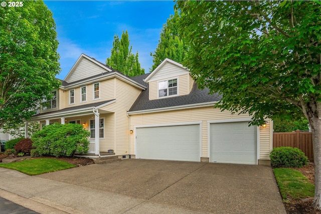 61 SW Wallingford Way, Beaverton, OR 97006 - traditional home with a porch, driveway, an attached garage, and roof with shingles