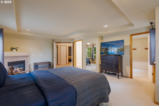 61 SW Wallingford Way, Beaverton, OR 97006 - bedroom with a tray ceiling, carpet flooring, a tile fireplace, recessed lighting, and baseboards