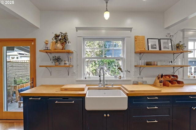 3701 NE Davis St, Portland, OR 97232 - kitchen featuring open shelves, butcher block counters, and healthy amount of natural light
