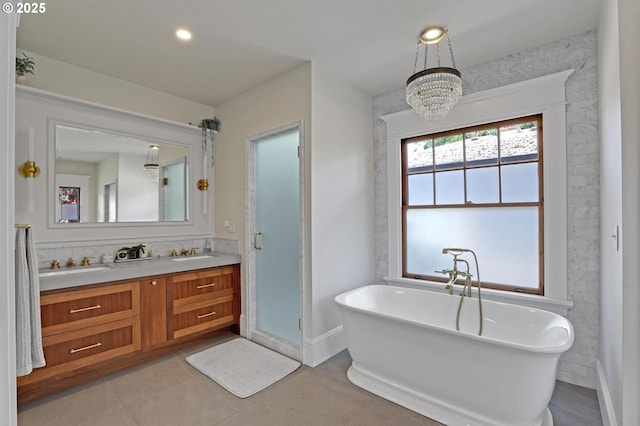 3701 NE Davis St, Portland, OR 97232 - full bath with double vanity, a soaking tub, a chandelier, tile patterned floors, and a shower with shower door