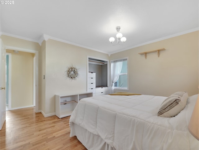 1466 8th St, Astoria, OR 97103 - bedroom with ornamental molding, light wood-type flooring, a chandelier, and baseboards