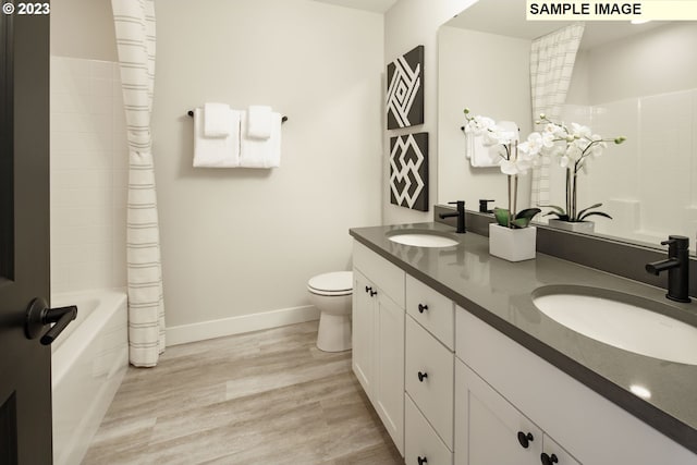 352 S 88th Ave, Ridgefield, WA 98642 - full bath featuring double vanity, wood finished floors, and shower / washtub combination