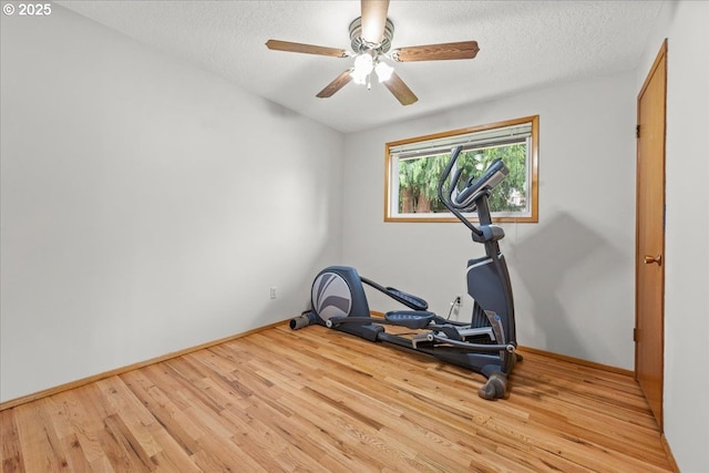 2130 SW 195th Ave, Beaverton, OR 97003 - workout room featuring wood finished floors, a textured ceiling, and a ceiling fan
