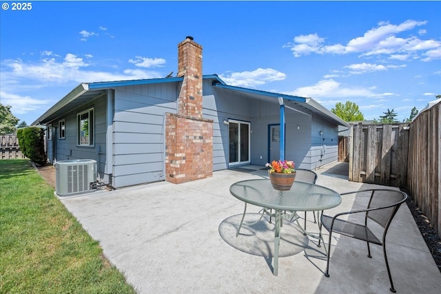 2130 SW 195th Ave, Beaverton, OR 97003 - rear view of house featuring a patio and a chimney