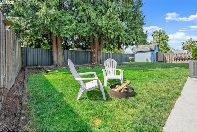 2130 SW 195th Ave, Beaverton, OR 97003 - fenced backyard with an outdoor fire pit and a storage shed