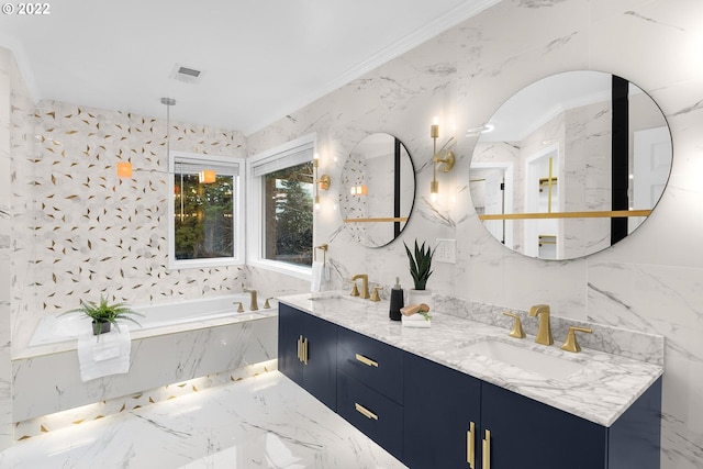 bathroom featuring tile walls, tiled tub, double vanity, and ornamental molding