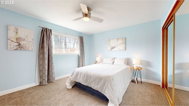 bedroom with a closet, baseboards, and carpet floors